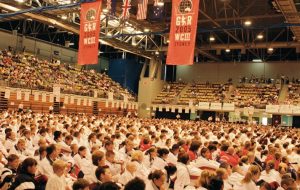 Stadium full of karate students sitting crossed legged for the GKR 2005 World Cup Sydney