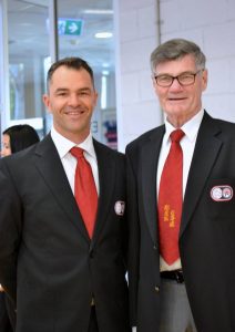 two mean wearing suits at the black belt open tournament