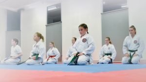 gkr karate students bowing in a dojo