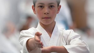 a karate student performs a move