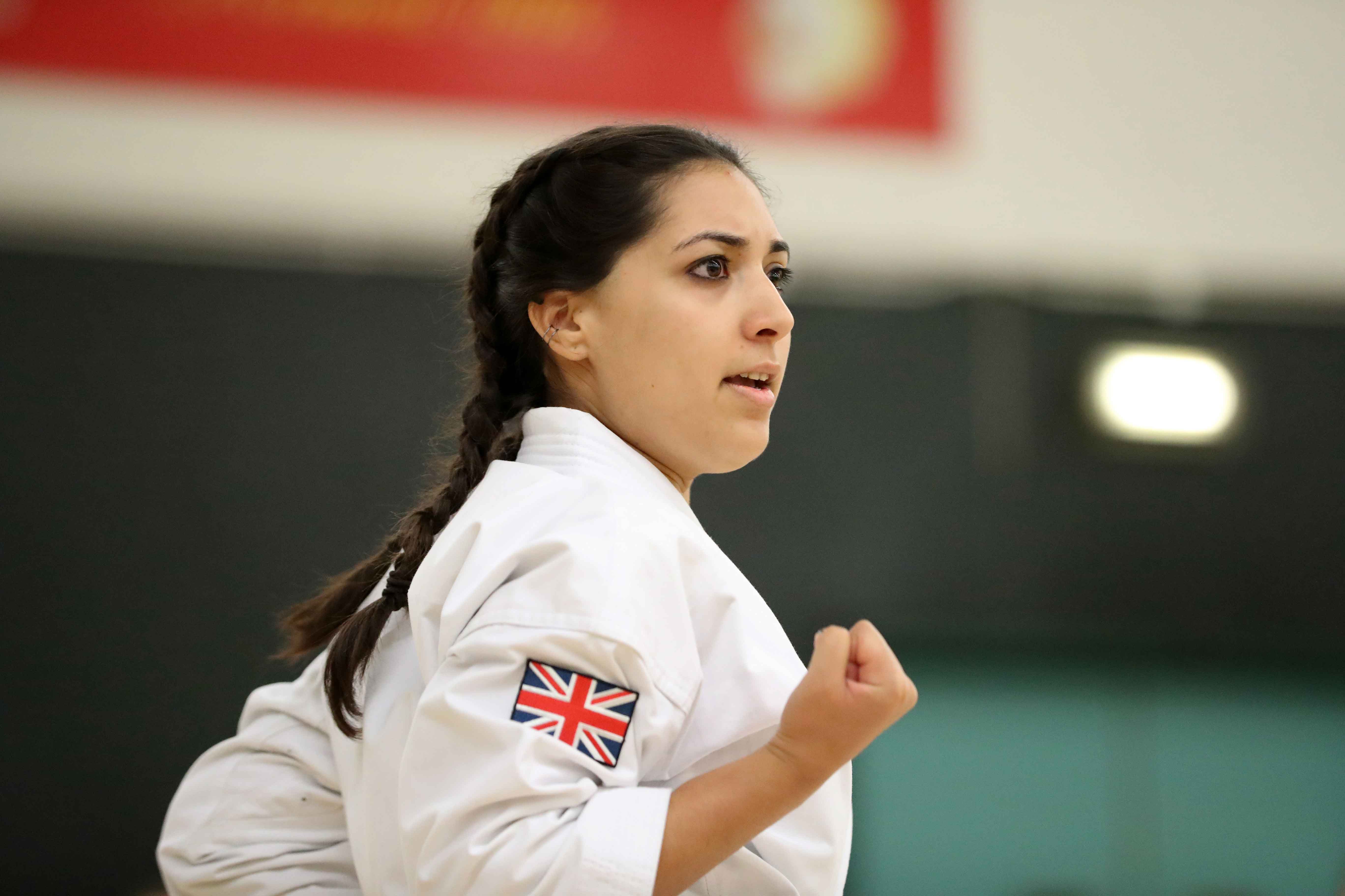 Kyra Gaiger, a karate practitioner, demonstrating a martial arts technique