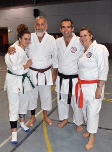 In cherished company: Bill Terry is flanked by his extended family – Patience (left), Sensei Rowan Cassidy and Zita
