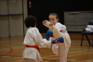 two young karate students competition against each other