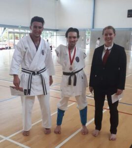 three students receiving awards