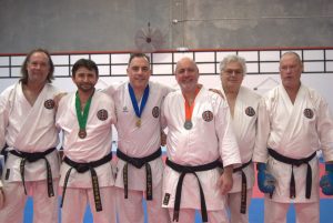 6 black belt karate students