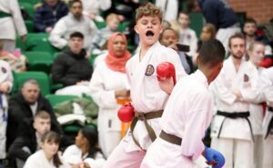 two young boys practicing karate